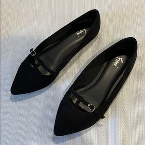 Black pointed T-strap flats